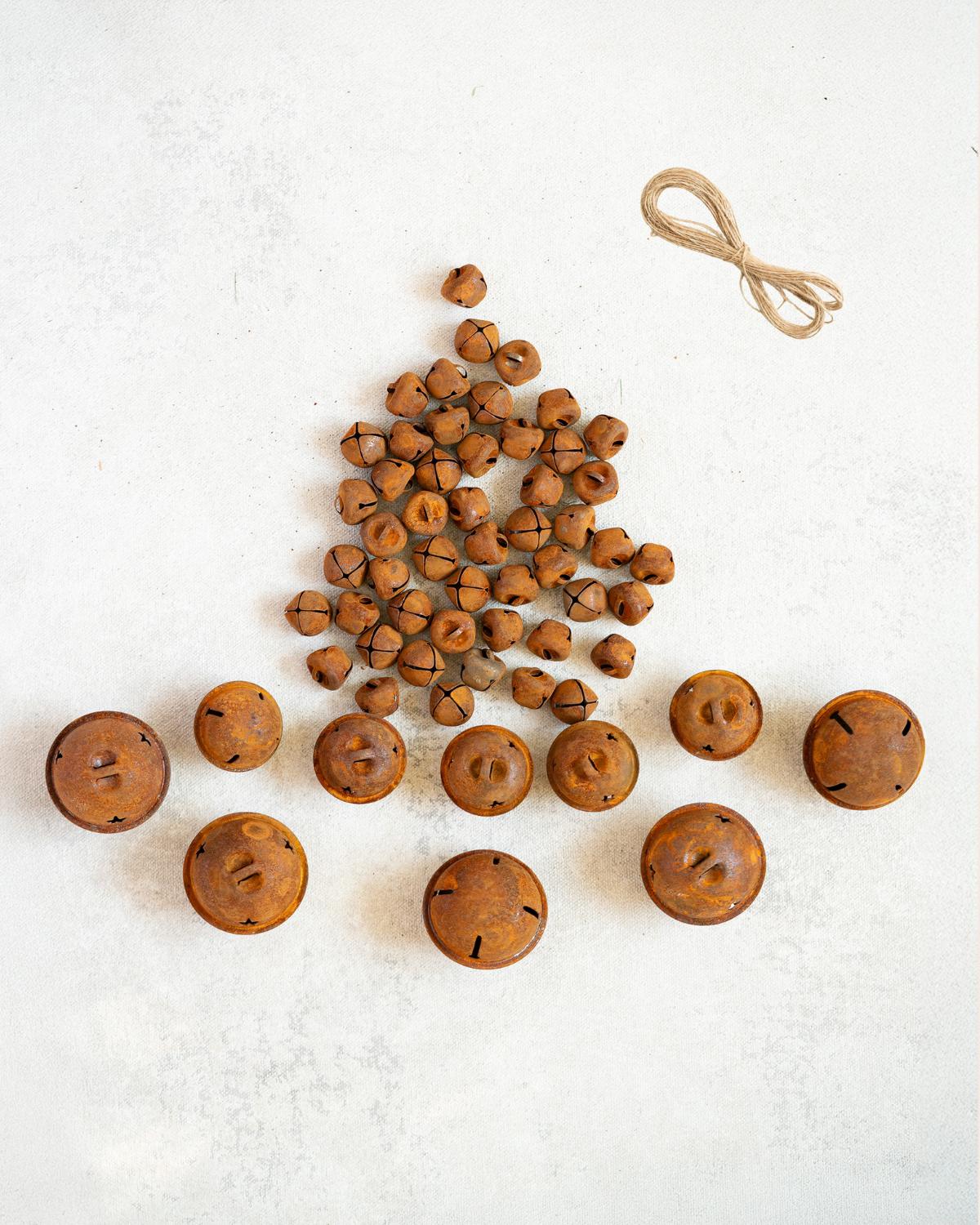 60 Rustic Bells with Holes — Jute Twine Included, Americana Cross & Star Cut Craft Supplies for Christmas Tree, Farmhouse Decor, Holiday DIY